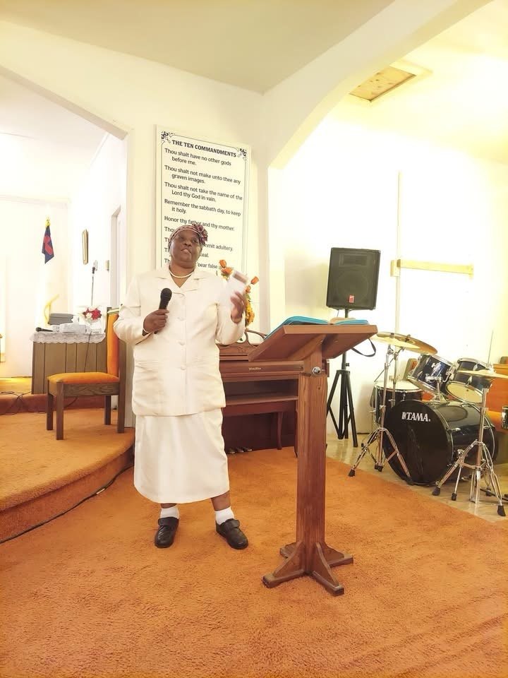One of the seven speakers at the Seven Last Words service, speaking at the front of the sanctuary