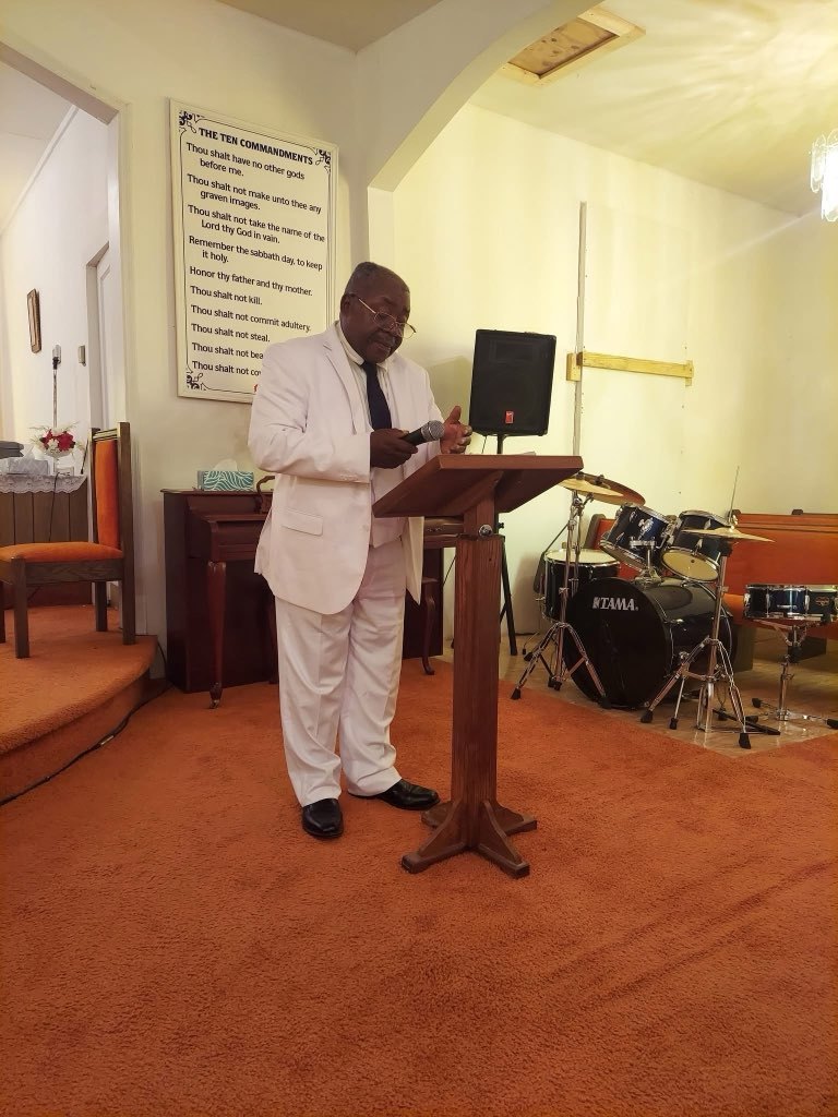 One of the seven speakers at the Seven Last Words service, speaking at the front of the sanctuary