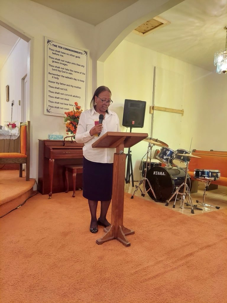 One of the seven speakers at the Seven Last Words service, speaking at the front of the sanctuary