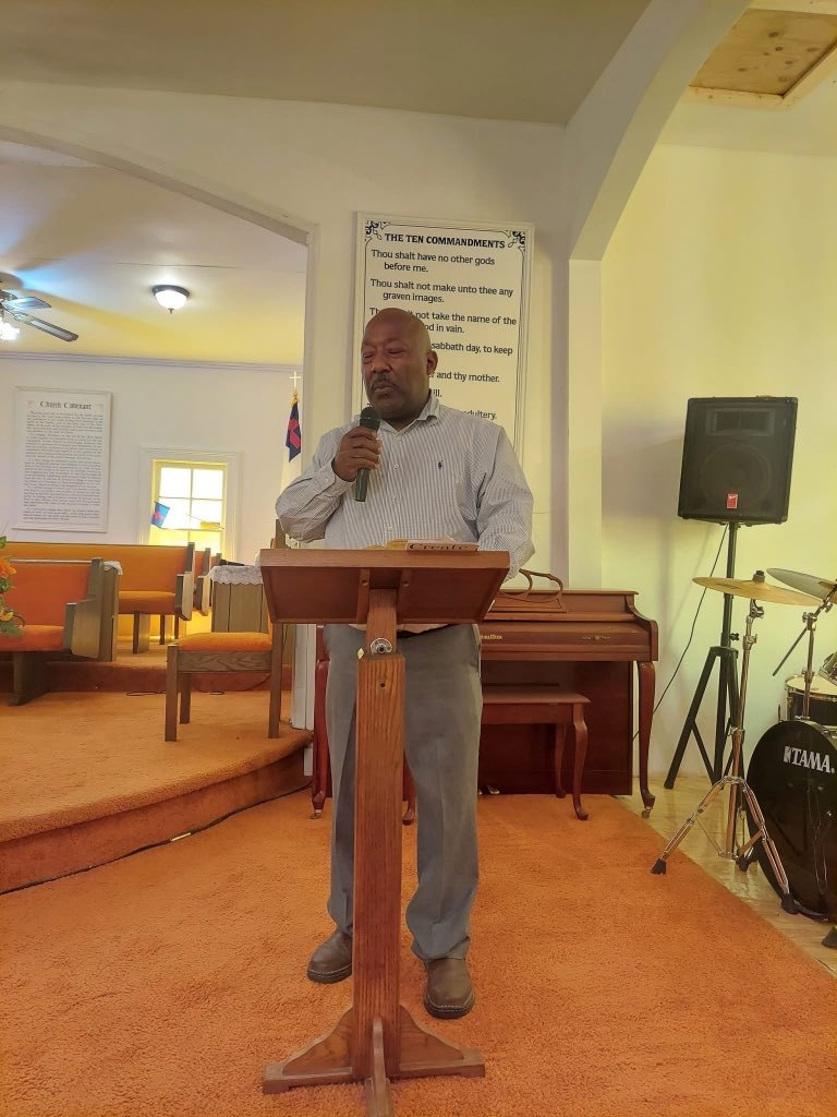 One of the seven speakers at the Seven Last Words service, speaking at the front of the sanctuary