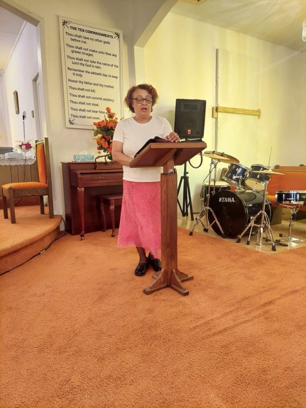 One of the seven speakers at the Seven Last Words service, speaking at the front of the sanctuary